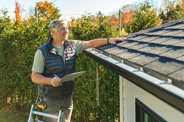 Professional Roof Replacement technician working in Warren, AR